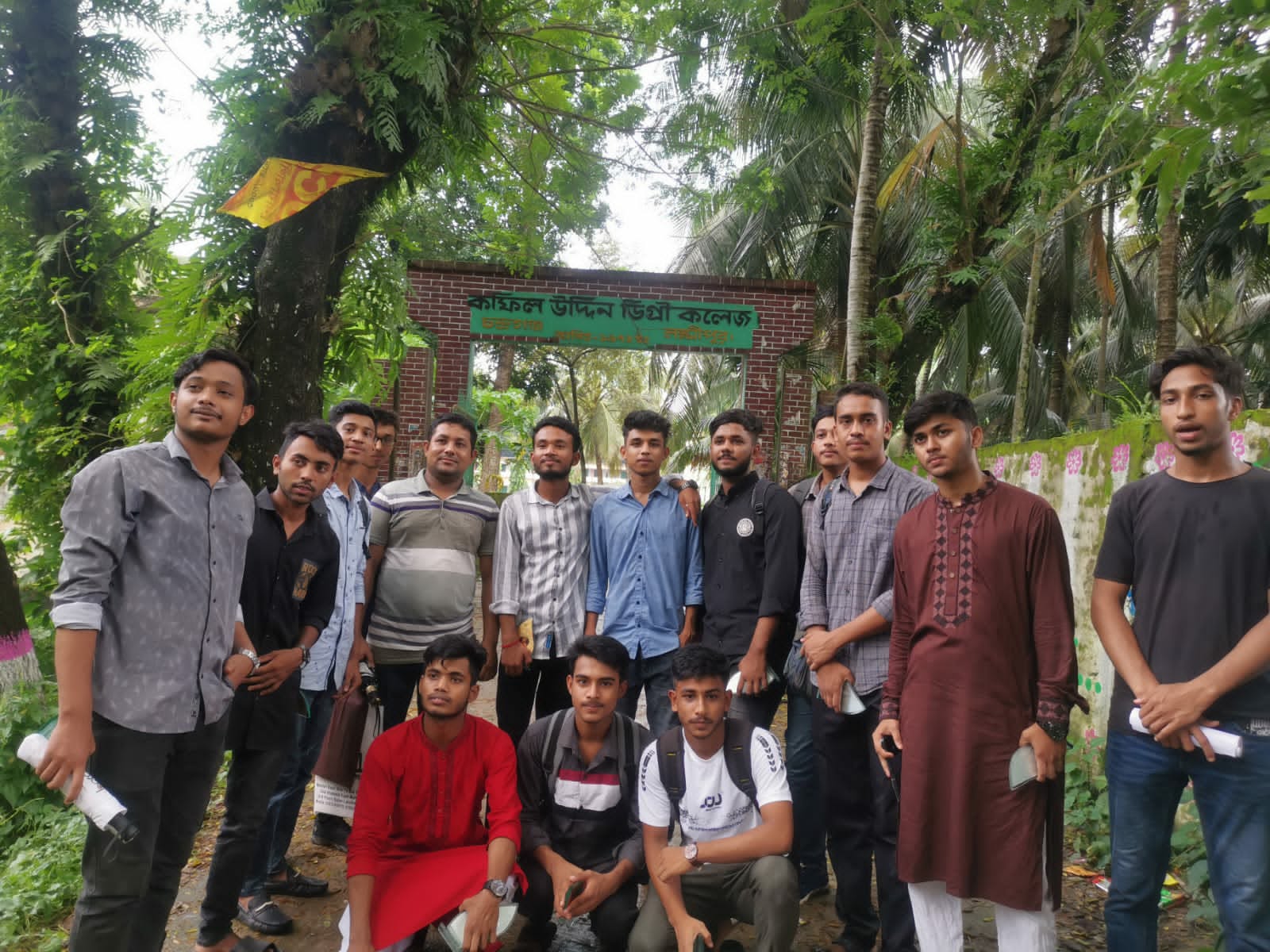 KUDC Students standing at the College Gate